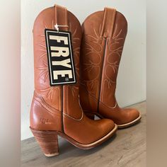 Frye Womens Western Cowboy Boots Brown Leather Lined Mid Calf Pull On 4.5 B New Brand New Boots With Tags, May Have Some Minimal Scratches Due To Storage. Brand: Frye Style: Western Cowboy Boots Color: Brown Heel Height: High Heel (3-3.9 In) Upper Material: Leather Shoe Width: B Style Number: 6195 Sold As Pictured. Thanks For Looking! Questions? Leave A Comment Below! Leather Combat Boots Women, Frye Cowboy Boots, Cowboy Boots Brown, Suede Combat Boots, Frye Harness Boots, Black Moto Boots, Leather Hiking Boots, New Boots, Black Riding Boots