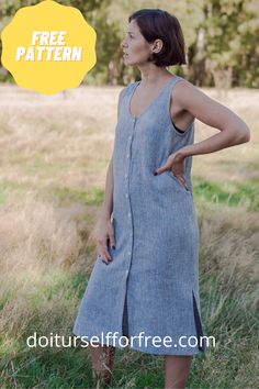 a woman is standing in the grass with her hands on her hips and looking off to the side