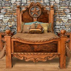 a wooden bed sitting in front of a stone wall