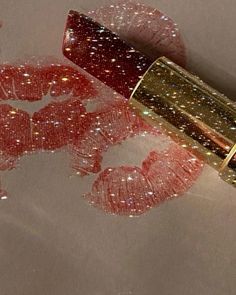 a lipstick with glitters on it