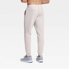 Why we're ALL IN: Mesh spacer joggers with a solid-color finish, double-knit texture, mid rise, full length and banded cuffs. Crafted from a lightweight fabric blend with stretch for comfortable wear that moves with you. Tailored in a regular-fit silhouette. Feature side pockets and a zippered back pocket for stashing go-to essentials, and a drawstring waistband for a customizable fit. All in Motion™: Inspiring the potential in every body. Sportswear Bottoms With 5-inch Inseam For Gym, Fitted Athleisure Sweatpants With Elastic Side Panels, Jogging Sweatpants With Ribbed Waistband And Tapered Leg, Solid Color Tapered Leg Joggers For Jogging, Tapered Leg Sweatpants With Ribbed Waistband For Jogging, Sporty Fitted Joggers With Elastic Waistband, Comfort Stretch Joggers With Ribbed Waistband And Tapered Leg, Fitted Casual Joggers With Ribbed Waistband, Fitted Joggers With Elastic Waistband