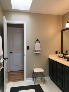 the bathroom is clean and ready to be used as a guest room or family room