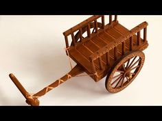 an old fashioned wooden wagon with wheels