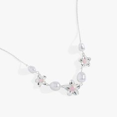 Silver Silver Flower-shaped Jewelry With Pearl Drop, Silver Flower Jewelry With Pearl Drop, Delicate Floral Pearl Necklace, Feminine Silver Flower Pendant Necklace, Feminine Silver Flower Necklace, Pearl White Flower Necklace, Pearl White Flower-shaped Jewelry With Pearl Charm, Pearl White Flower Jewelry With Pearl Charm, Pearl White Jewelry With Flower-shaped Pearl Charm