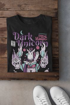 This T-Shirt was designed by Eldritch Curiosities, exclusively for Adventurers and RPG Enthusiasts! Show up to your next role-playing game session in style, wearing the latest in DnD fashion.   All our garments are made to order, using the softest, most premium quality fabrics on the market; with strong seams that hold their shape making it long-lasting. Printed using only high quality inks, resulting in vibrant colors, even after countless washes! Guaranteed to become your favorite! Produced and shipped with the help of our Printing Partners in the USA. We and they are part of an artisan community, responsible for creating thousands of jobs and we thank you for supporting our small business! <3 Oh did we mention we offer FREE SHIPPING WORLDWIDE?! You're Welcome! Favorite our listing and s Dnd Fashion, Dark Unicorn, Geek Gifts For Him, Unicorn Tshirt, Geek Gifts, Funny Meme, Role Playing, Unisex Shirt, Wizard