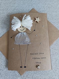 a card with an angel on it that says, may all your wishes come true