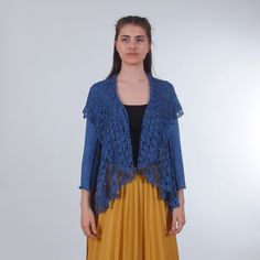 "Elegant open front cardigan knit entirely by hand. Almost the entire body of the cardigan consists of handmade lace. Made of 50% cotton and 50% viscose. ♡ Colors ♡ The cardigans in the images are in blue, turquoise and light gray. For other color options you can refer to the images. ♡ Sizing ♡ You can find a size chart in the last image of the listing. Alternatively, you can choose the \"Custom\" size and send me your measurements - I will knit the model according to them. ♡ Custom orders ♡ If Knit Lace Cardigan, Bohemian Blue Handmade Cardigan, Fitted Elegant Cardigan With Crochet Lace, Elegant Long Sleeve Cardigan With Crochet Lace, Long Sleeve Crochet Lace Knit Cardigan, Fitted Lace Cardigan With Crochet Details, Cardigan Handmade, The Cardigans, Cardigan Knit