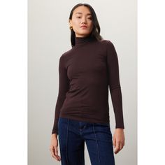 Aubergine knit (94% Viscose, 6% Elastane). Sweater. Turtleneck. Long Sleeve. Pull on. 24" shoulder to hemline. Imported. Brown Stretch Turtleneck Tops, Purple Tops For Fall Layering, Purple Winter Workwear Tops, Fitted Top For Workwear In Fall, Fitted Top For Fall Workwear, Brown Fine Knit Turtleneck Top, Versatile Stretch Brown Top, Fitted Fine Knit Top For Fall, Fine Knit Stretch Top For Fall