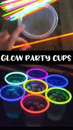 glow party cups with the text glow party cups on it and neon sticks sticking out of them