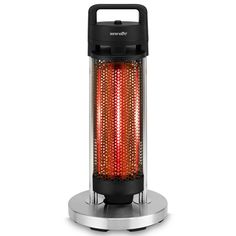 an electric heater with red beads on the front and black top, sitting on a silver base