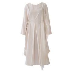 ‘Au Bord de la Mer’ cotton midi dress features a delicate ruffle attached on the left side, complemented by princess darts and a large inverted pleat on the front and back, creating an elegant structure to the garment. Likewise, side drawstrings were added to accentuate the waist, making the dress adaptable to various sizes and body types. 100% Undyed Premium Cotton  Wash at or below 30ºC, together with similar colours. Do not use bleach. Do not tumble dry. Iron inside out on a low to medium tem White Cotton Pleated Midi Dress, White Dresses With Pleated Sleeves For Daywear, Off White Ruffled Midi Dress For Daywear, Cotton Dresses With Pleated Sleeves For Daywear, Cream Cotton Midi Dress For Daywear, White Linen Ruffle Dress For Daywear, Elegant Cotton Midi Dress With Asymmetrical Hem, Elegant White Asymmetrical Dress With Ruffles, Elegant Cream Cotton Midi Dress