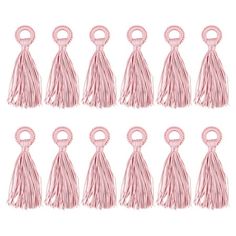 twelve pink tassels with circular handles