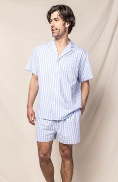 Keep cool as you lounge or dream in these gingham short pajamas made from cotton that gets softer with each washing. Top has notched collar; short sleeves Bottoms have elastic/drawstring waist 100% cotton Machine wash, dry flat Imported Plaid Cotton Sleepwear For Lounging, Cotton Plaid Sleepwear For Lounging, Gingham Cotton Sleepwear For Sleepover, Gingham Cotton Sleepwear For Bedtime, Casual Gingham Sleepwear For Pajama Party, Cotton Gingham Sleepwear, Gingham Cotton Sleepwear With Relaxed Fit, Plaid Cotton Summer Sleepwear, Casual Gingham Sleepwear For Loungewear