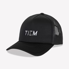 The perfect hat to throw on after a workout. This black trucker hat features a white TIEM logo on the front panel and has an adjustable back. Functional Streetwear Trucker Hat With Curved Bill, Sporty Trucker Hat For Streetwear, Sporty Trucker Hat With Flat Brim, Hip Hop Trucker Hat With Curved Brim For Sports, Sporty Trucker Hat With Letter Print For Outdoor, Hip Hop Style Sports Trucker Hat, Hip Hop Sports Trucker Hat With Flat Brim, Sporty Trucker Hat With Mesh Back And Curved Brim, Black Breathable Trucker Hat With Curved Brim