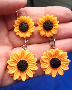 Brighten up your day with these summery resin sunflower stud earrings. Light weight resin material Resin Sunflower, Summer Sunflower, Sunflower Earrings, Resin Material, Jewelry Earrings Dangle, Etsy Earrings, Sunflower, Dangle Drop Earrings, Dangle Earrings