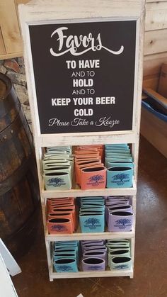 a sign that is on the side of a shelf with some drinks in it and other items