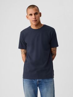 Soft cotton jersey T-shirt.  Crewneck.  Short sleeves.  Standard fit.  Slim through the chest and shoulders.  Hits at the hip.  Colin in black, blue) is 6'2"/188cm with 32"/81cm waist and 32"/81cm inseam wearing regular Gap Jersey T Shirt, Black Blue, Classic T Shirts, Gap, Short Sleeves, Crew Neck, T Shirt, How To Wear, Blue