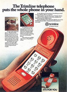 an old cell phone ad from the'80s, with someone holding it in their hand