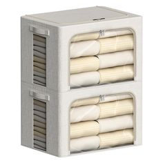 two storage boxes with rolls of toilet paper in each one, both stacked on top of each other