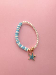 Heishi, Pearl and Starfish detail bracelet Beachy Bracelet Ideas Clay Beads, Clay Bead Bracelet Ideas Starfish, Beach Bracelet Ideas, Beach Bracelets Diy, White Starfish Ocean-inspired Bracelet, Starfish Clay Bead Bracelet, Ocean Clay Bead Bracelets, White Starfish Bracelet With Ocean-inspired Style, Beach Bracelet Shien