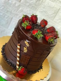 a chocolate cake with strawberries on top