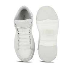 Saint Dafne, a classic white mid top sneaker adds a modern finish to any style. Crafted from luxury Italian leather, feature brand patch detailing at back and finished with soft flexible Italian sole. You can flaunt these designer sneaker with a pair of jeans and a T-shirt to make a style statement. PRODUCT SPECIFICATION Upper - Premium Leather Lining - Soft Leather Insole - Padded Leather Closure - White Lace-up Sole - Soft Flexible Italian Sole. SIZE & FIT Regular Fit OUR PROMISE We assure the Designer Sneaker, High Ankle Boots, Mid Top Sneakers, Mid Top, The Saint, Boot Bag, Long Boots, Sneaker Wedge, Calf Boots