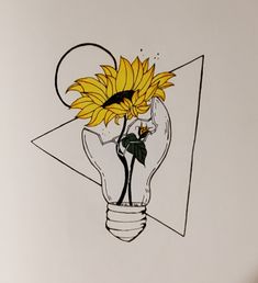 a drawing of a light bulb with a sunflower in it