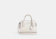 Andrea Carryall | COACH OUTLET Elegant Medium Workwear Bags, Elegant Medium Satchel With Detachable Strap, Formal Medium Bag With Detachable Strap, Elegant Medium Formal Bag, Elegant Formal Bags, White Satchel With Adjustable Strap For Work, Coach Crossbody Satchel For Work, Classic Medium Shoulder Bag With Removable Pouch, Classic White Bag For Work