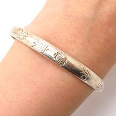 925 Sterling Silver Vintage Asia Chinese Writings Bangle Bracelet 7 1/4"Weight: 18.5gWELCOME TO PAWN SHOPWe are an actual pawn shop and have been in business for over 25 years.Since 1990, our establishment has been serving a variety of clients by providing them with short term cash solutions and options of liquidity regarding their treasured heirlooms.Acknowledging that today′s customers are very sophisticated and are looking for a variety of investments, our acquisitions are hand-picked for our Silver Collectible Bracelets, Spiritual Silver Bangle For Anniversary, Silver Spiritual Bracelets For Anniversary, Sterling Silver Stamped Bracelet, Symbolic Silver Bracelet For Anniversary, Collectible Sterling Silver Bangle Bracelet, Sterling Silver Bracelet Stamped 925 For Anniversary, Engraved Sterling Silver Bracelet Collectible, Engraved Sterling Silver Symbolic Bracelet