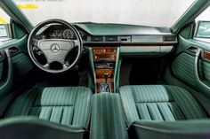 the interior of an old mercedes benz coupe