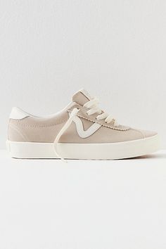 Minimalism rules with these low-top sneakers from Vans, taking notes from retro styles for a totally-charming, go-with-anything pair. **Features:** Low-top style, suede uppers, single-wrap sidewalls, padded collar, leather " v" logo and heel counter, rubber outsole, lace-up closure **Why We | Vans Sport Low Suede Sneakers at Free People in White, Size: US 4.5 M Vans Cream Low-top Sneakers, Cream Vans Sneakers For Spring, Cream Low-top Vans Sneakers, Beige Low-top Vans Sneakers, Vans Everyday Sneakers With Round Toe, Vans Sneakers With Round Toe For Everyday Wear, Vans Everyday Sneakers, Beige Lace-up Vans Sneakers, V Logo