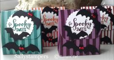 halloween treat bags with bats and spooky sweets on them