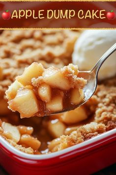 a spoonful of apple dump cake in a red dish with ice cream on top