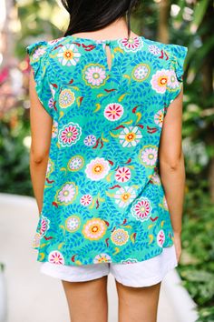 The Finally Found You Emerald Green Floral Blouse, crafted with a vibrant floral print, classic fit, and pleated detailing, is perfect for elevating any daytime look. Its timeless design ensures a polished look that'll have you turning heads. This blouse features a round neckline, short cap sleeves, pleated detailing, and a vibrant floral print. Material has no amount of stretch.Cindy is wearing the small. Floral Print Rayon Blouse For Vacation, Vacation Rayon Blouse With Floral Print, Floral Print Rayon Tops, Multicolor Floral Print Rayon Blouse, Floral Print Patterned Rayon Tops, Patterned Floral Print Rayon Tops, Green Tops With Colorful Pattern For Spring, Spring Green Tops With Colorful Pattern, Green Top With Colorful Pattern For Spring