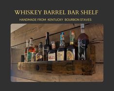 a wooden shelf filled with lots of bottles and liquors next to a sign that reads whiskey barrel bar shelf handmade from kentucky bourbon