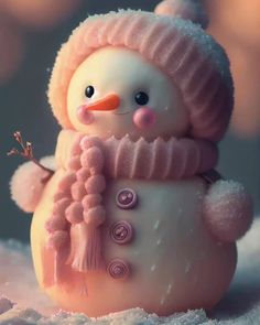 a snowman with a pink hat and scarf