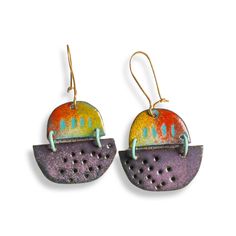 You will get a ton of compliments when you wear these unique spaceship inspired enamelled statement earrings.  The enamel is used in a painterly way for added interest. These lightweight, unusual earrings come with high quality hand formed brass ear wires that clasp so you never have to worry about losing them. What is enamel?   Enamel is made by fusing multiple layers of glass to a prepared metal at a very high heat.  Each earring requires between four to 10 layers of enamel depending on the ef Retro Enamel Earrings As Gift, Multicolor Enamel Earrings, Gold Multi-stone Enamel Jewelry, Artsy Enamel Drop Earrings, Artisan Enamel Drop Earrings, Bohemian Multicolor Enamel Earrings, Vintage Hand-painted Enamel Earrings, Artsy Jewelry, Copper Sheets