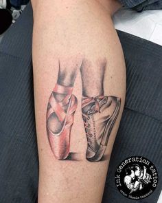 a woman with a tattoo on her arm has a pair of ballet shoes