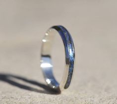 Ultra slim ring in sterling silver or 9ct yellow, white or rose gold with loose fur/hair or ashes set in crystal resin. Suitable for dog, cat or other pet fur, short horsehair or cremation ashes. 4mm wide by 2 mm deep tapered edges  Glitter colours can be chosen on my website here: https://enigmahorsehairjewellery.co.uk/cremation-ash-jewellery Gemstones can be added from my Gemstones collection or I can source anything that isnt shown, please message me for pricing: https://enigmahorsehairjewell Sterling Silver Keepsake Rings, Silver Keepsake Ring, Ashes Jewelry Cremation, Ring Cat, Ashes Ring, Slim Ring, Memorial Ring, Memorial Pendant, Silver Horse