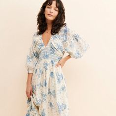 Get ready to turn heads with our Golden Hour Maxi Dress! With its timeless print and flattering maxi silhouette, this dress is perfect for any occasion. The V-neckline and exaggerated sleeves add an extra touch of dimension to elevate your look. Don't miss out on this must-have dress! Floral Print V-neck Flowy Maxi Dress, Patterned Flowy Long-sleeve Maxi Dress, Pink Printed Floor-length Maxi Dress, Beige V-neck Floral Maxi Dress, Pink Floral Print V-neck Maxi Dress, Wedding Gown Simple Elegant, Wedding Gown Simple, Enchanted Garden Wedding, Exaggerated Sleeves