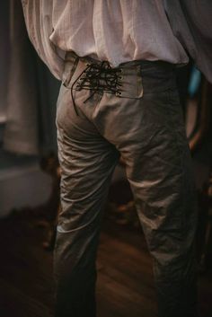 This is a beautiful pair of men's leather lace up pants. They have lacing up both sides as well as lacing in the front. Made from 100% leather in any color you like and made to your measurements. Every item we make is bespoke and made to wear for years to come. These have a lovely lacing detail in the back that makes it possible to adjust your size a bit as we all gain and loose weight over the years. This is a great starter piece or perfect for fleshing out your existing wardrobe. You can choos Mens Leather Pant Festival, Pirate Pants For Men, Mens Ren Faire Outfit, Leather Lace Up Pants, Medieval Clothing Men, Cottagecore Fashion Male, Lace Up Pants, Leather Button Up, Side Pants