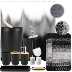 black and white bathroom accessories including soap dispenser, toothbrush holder, toilet brush