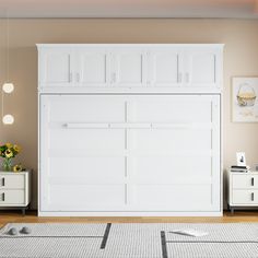 a white garage door sitting in the middle of a living room next to a dresser