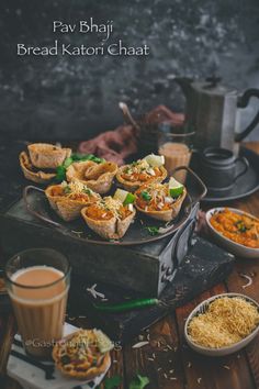 some food is sitting on a table with other dishes