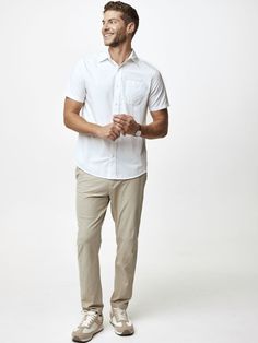 The White short sleeve stretch button up isn't just another shirt - it's your gateway to effortless comfort. This button-up shirt is stretchy and fits well with whatever you already own. All day comfort is ensured by the smooth, wrinkle-resistant fabric (which also has a hint of stretch) without compromising the polished, clean look. The White Stretch Button Up looks great and feels even better—no ironing needed! Mens Short Sleeve Button Down, Navy Pants Men, Obx Beach, White Button Up, Thermal Long Sleeve, Mens Chinos, Mens Khakis, Mens Casual Outfits, Short Sleeve Button Up