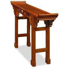 a wooden bench with carvings on the top and bottom, sitting in front of a white background