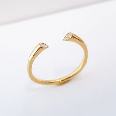 "★ ★ ★ Made with solid gold to ensure the strength of the ring.★ ★ ★ This diamond cuff ring, part of our \"Minimal Collection\" is a delicate, fashion piece to wear as well as an index ring or knuckle ring. Use as a standalone piece or with stacking rings. Item Details ❤ Made to Order ✔ Available Gold Color: Rose Gold, Yellow Gold, White Gold, ✔ Number of Diamonds: 4, total carat weight: 0.03Ctw, ✔ Diamond Color: G Color ✔ Diamond Clarity: VS ✔ Band details: Top Width: 2.4mm Thickness: 3.0mm Bot Adjustable Vvs Clarity Open Diamond Ring, Open Ring With Single Diamond, Adjustable Open Band Diamond Ring, Adjustable Single Diamond Open Ring, Promise Stackable Rings With Open Band, Adjustable Open Band Diamond Ring For Promise, Adjustable Open Diamond Ring, Vvs Clarity Open Diamond Ring, Adjustable Yellow Gold Open Diamond Ring