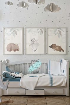 a child's room with three pictures on the wall and a bed in front