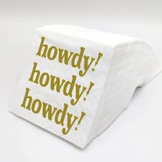 a white napkin with the words howdy, howdy, howdy written on it