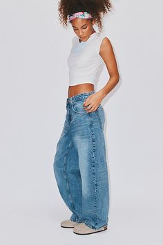 New favorite jeans from BDG – the BDG Bella Baggy Jeans. Overdyed BDG baggy jeans cut in a slouchy with a low-rise that sits comfortably at the hip. Relaxed fit throughout with a baggy silhouette that tapers ever so slightly toward the puddled hem. Complete with contrasting stitching throughout. Urban Outfitters exclusive. Features BDG Bella Baggy Jeans with a slightly tapered leg and overdyed finish Crafted from rigid BDG denim that will soften more and more over time Slouchy low-rise baggy jea Low Rise Baggy Jeans, Baggy Jeans Outfit, Slouchy Jeans, Baggy Jean, Bdg Jeans, Loose Fit Jeans, Cute Everyday Outfits, Baggy Jeans, New Wardrobe